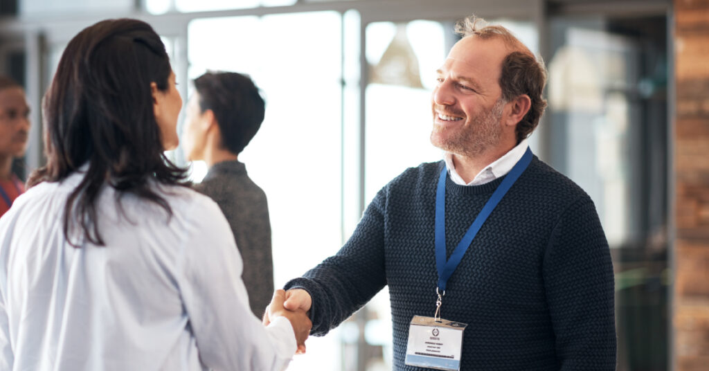 EATS attendees shaking hands